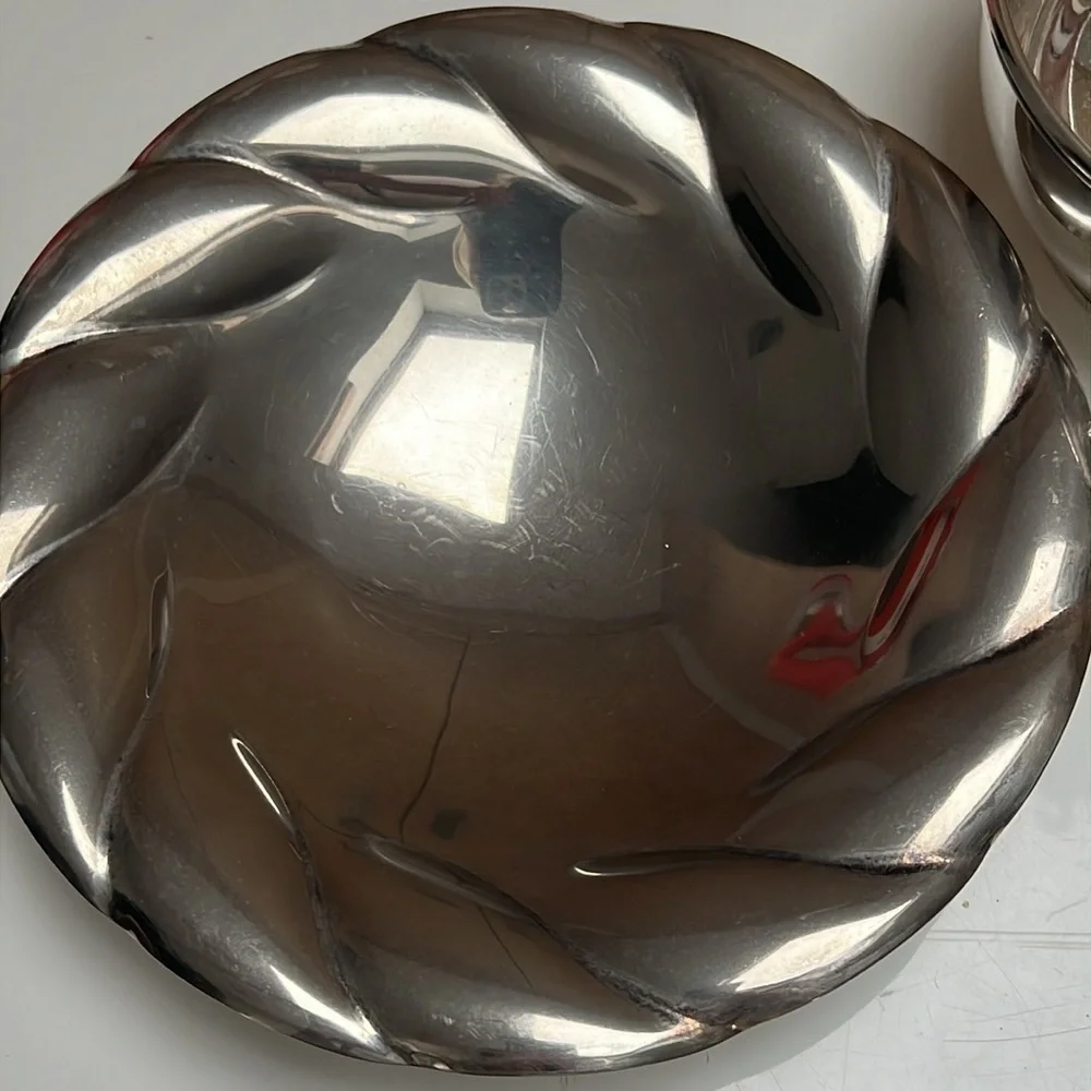 3 silver plated dishes.